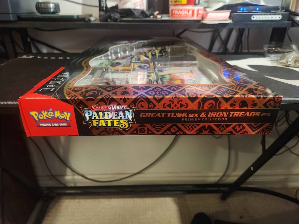 Pokémon paldean fates great tusk ex & iron treads ex premium collectio – Infini Comix / Infinite Comics